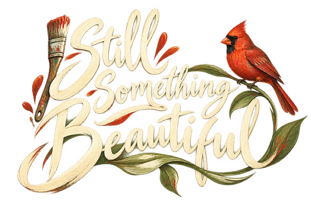 Hand-painted Still Something Beautiful lettering with a cardinal, paintbrush and green leaves.